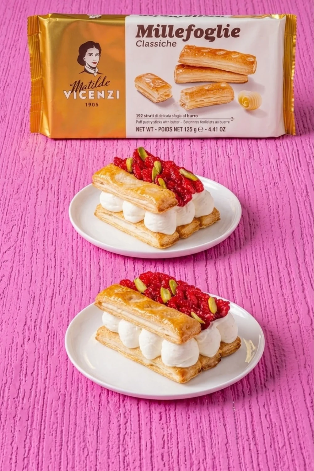 Matilde Vicenzi Millefoglie Classiche pastry pack with plated millefoglie and berries.
